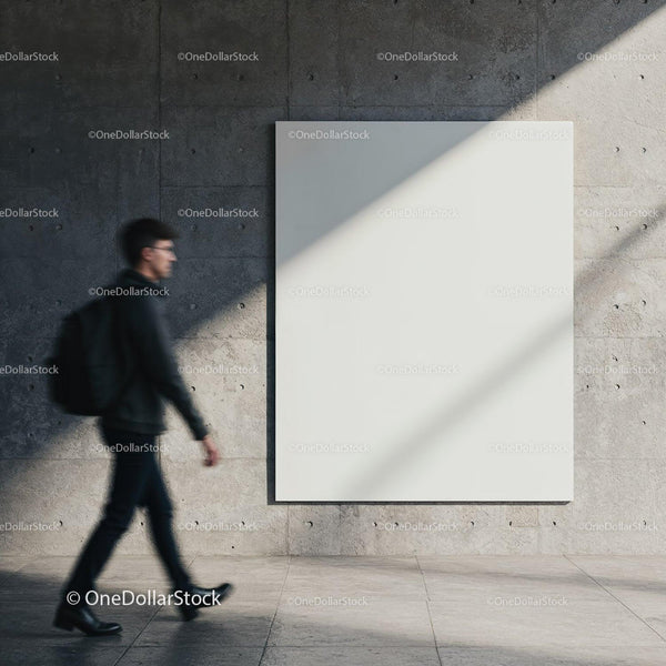 Blurred man walking past large blank canvas on concrete wall JPG Mockup Image
