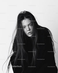 Intense Black and White Portrait of Young Woman with Wet Hair