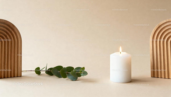 Minimalist candle and eucalyptus with wooden arches