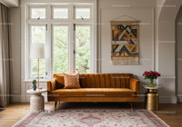 Modern Living Room with Velvet Sofa and Artistic Wall Decor