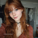 Portrait of a Red-Haired Girl with Blue Eyes in Casual Attire