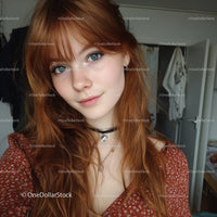 Portrait of a Red-Haired Girl with Blue Eyes in Casual Attire