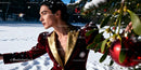 Elegant person in festive outfit outdoors in snow