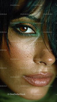 Close-up of a Woman with Green Eye Makeup and Detail Skin Texture