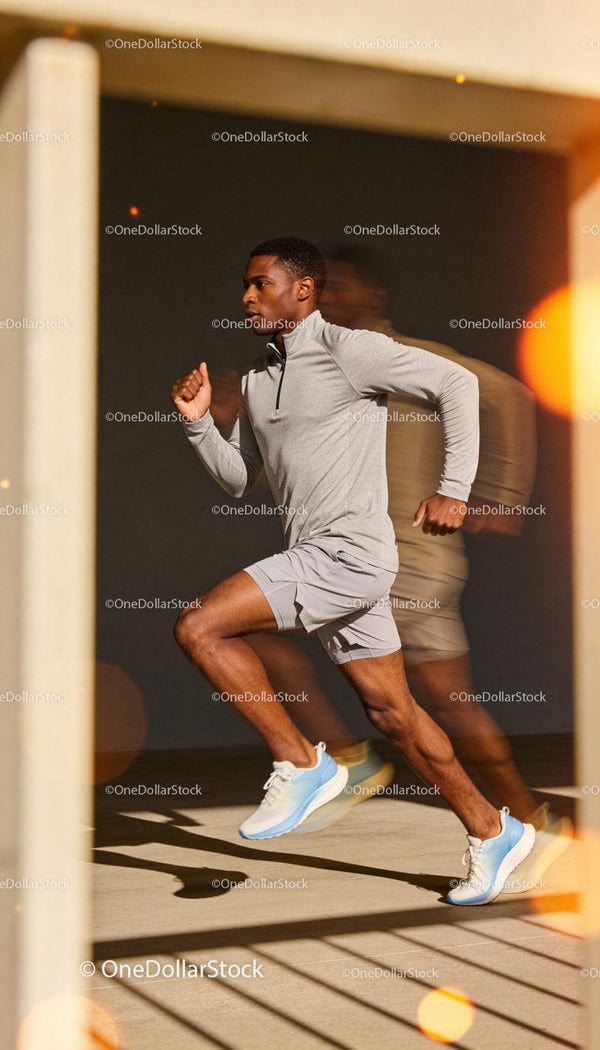 Athlete sprinting powerfully in urban outdoor setting