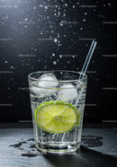 Refreshing sparkling water with lime slice and ice cubes