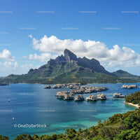 Tropical Mountain with Overwater Bungalows and Clear Blue Water