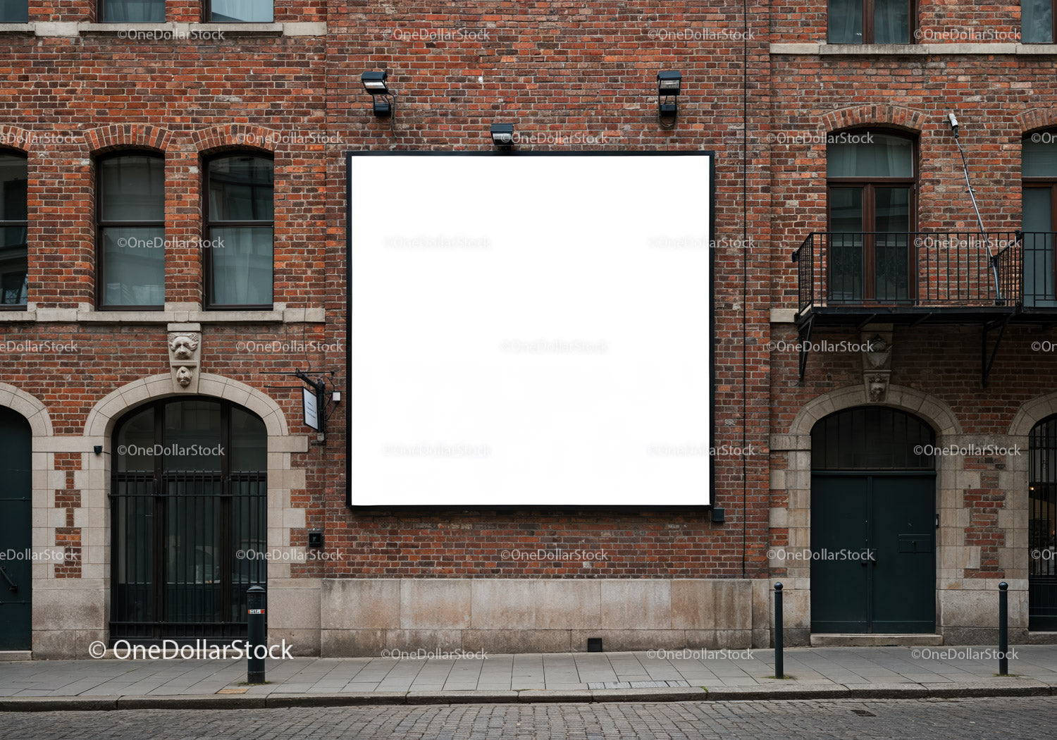 Empty square billboard on historic brick building facade