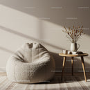 Cozy beige armchair with rustic wooden side table