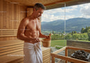 Male Man Using Sauna with Mountain View in Wellness Center