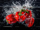Red Bell Peppers in Water Splash for Fresh Produce and Healthy Eating