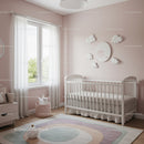 Baby Nursery Room with Cloud Wall Decor and White Crib