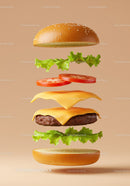 Deconstructed cheeseburger with fresh ingredients floating