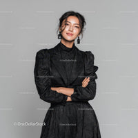 Elegant Woman in Black Dress with Statement Earrings