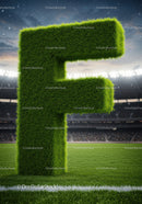 Large Grass Letter F on Football Stadium Field