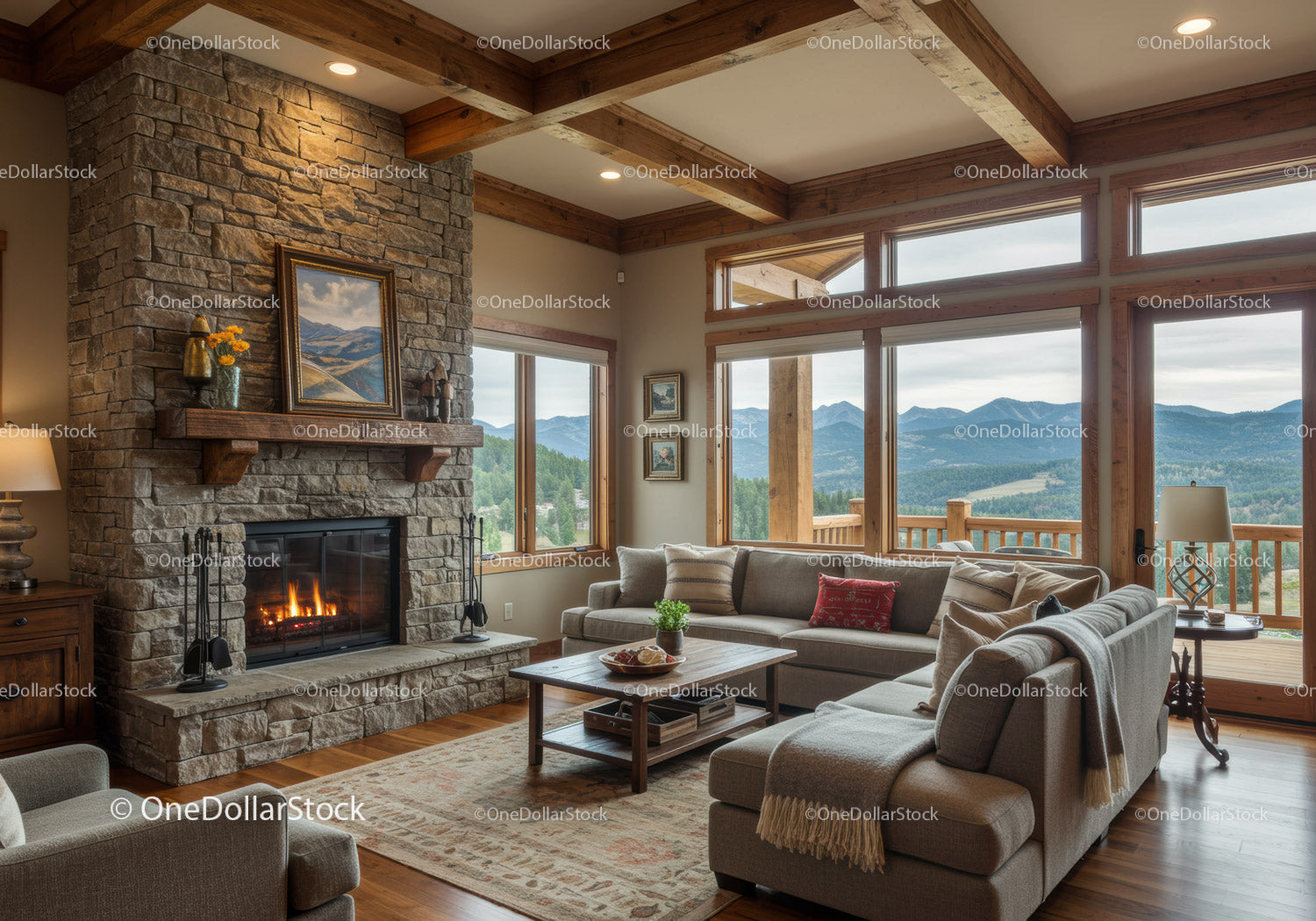 Cozy living room with stone fireplace and mountain view