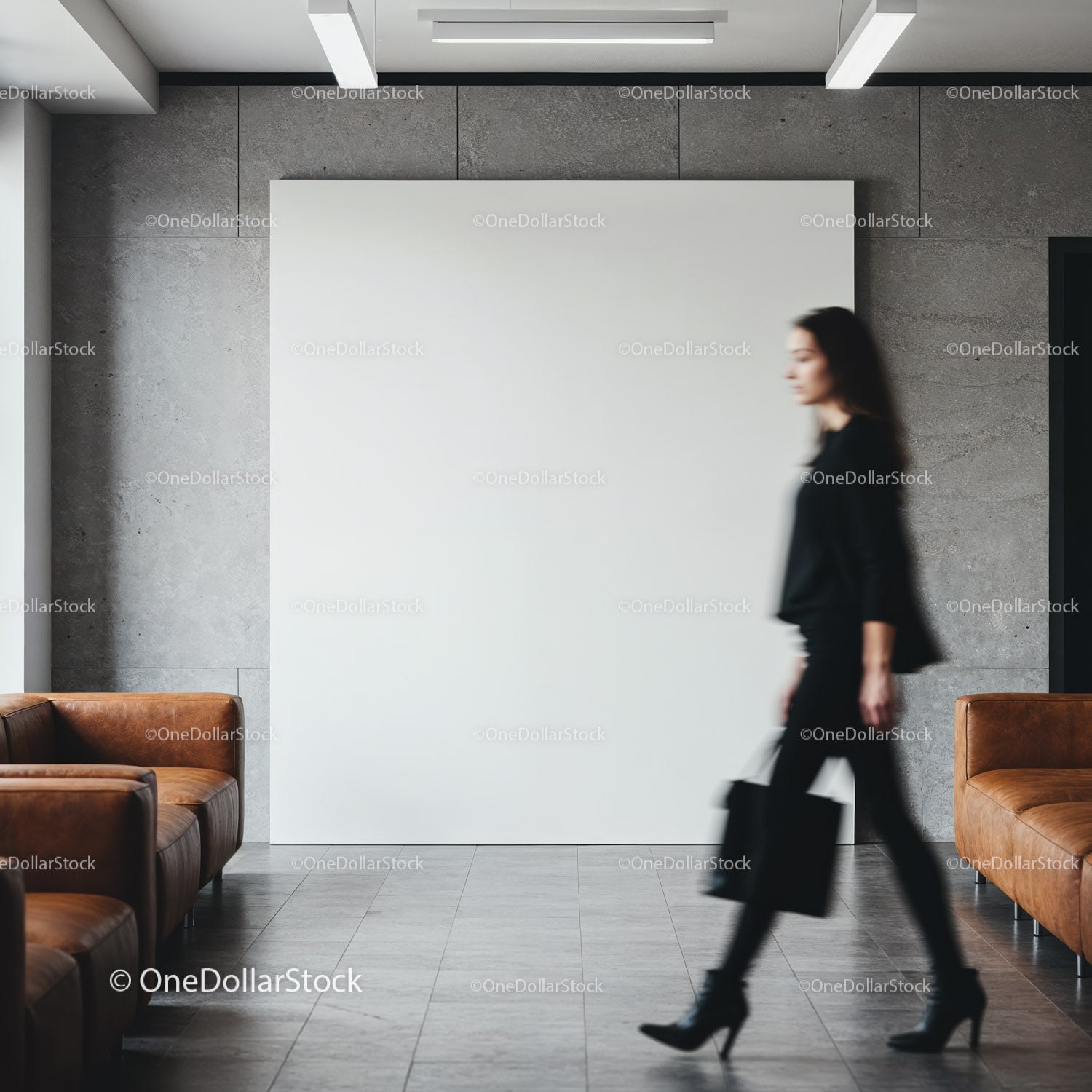 Blurred businesswoman walking past modern office seating