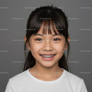 Cheerful Girl with Dark Hair and Braces in Bright White T-Shirt