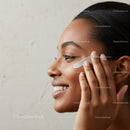 Close-up of Woman Applying Cream for Skin Care and Beauty