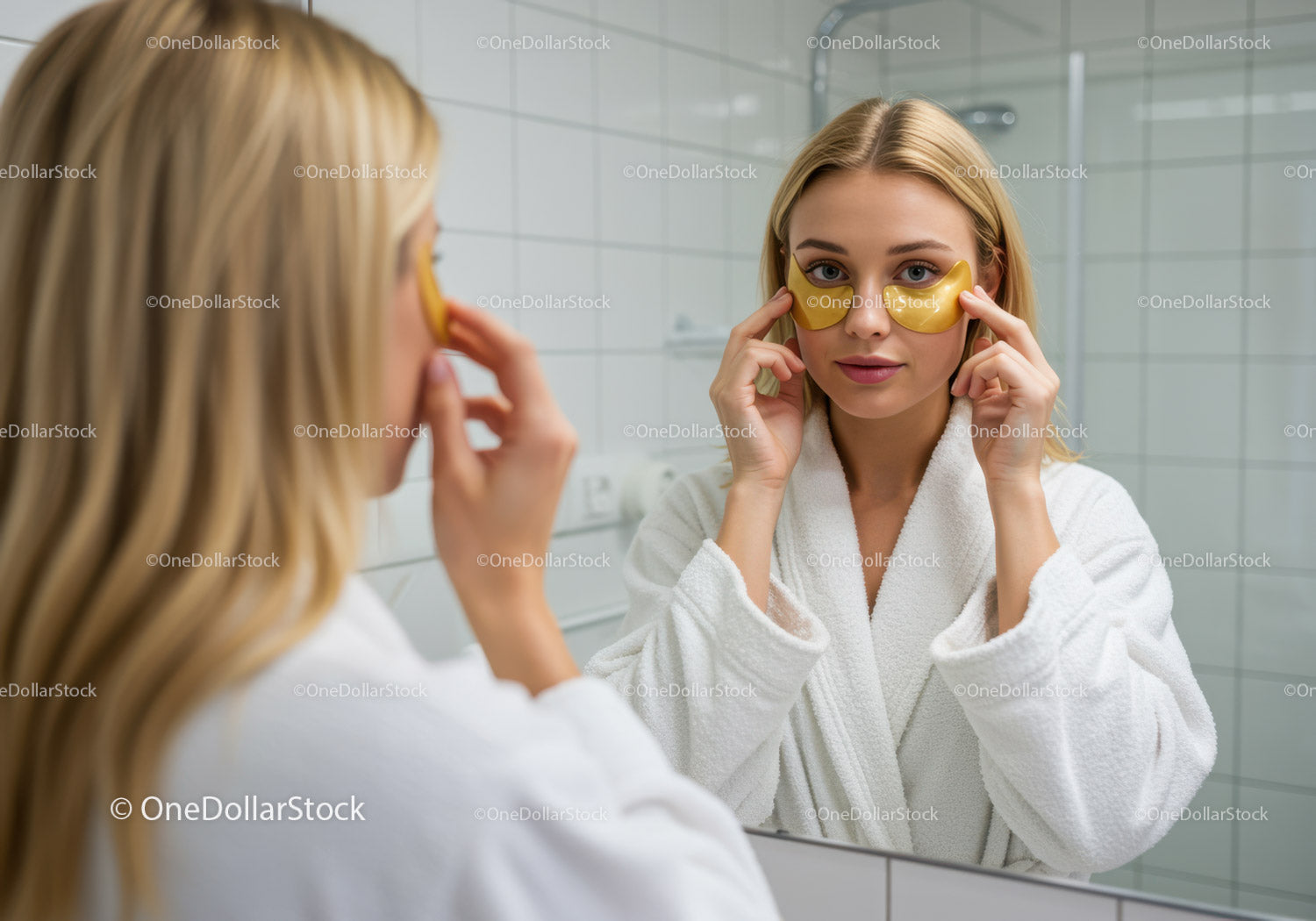Young Woman in White Robe Applying Face Mask in Spa Bathroom