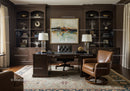 Elegant home office with classic leather chair and wooden desk