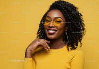 Bright and Cheerful Woman Wearing Yellow Sunglasses and Top