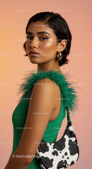 Chic Fashion Portrait of a Woman with Green Feathered Details and Cow Print Bag