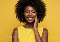 Elegant African American Woman with Curly Hair and Bright Smile
