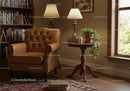 Cozy reading nook with leather armchair and warm lighting