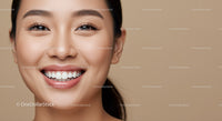 Close up of happy young woman with bright smile
