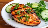 Gourmet Grilled Salmon with Cucumber and Parsley Garnish