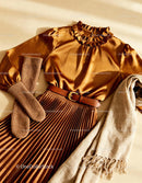 Stylish brown pleated skirt and cozy scarf outfit