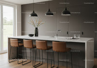 Modern kitchen with white marble island and brown leather bar stools