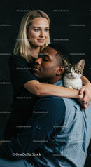 Couple Embracing with Cat in Warm, Quiet Moment