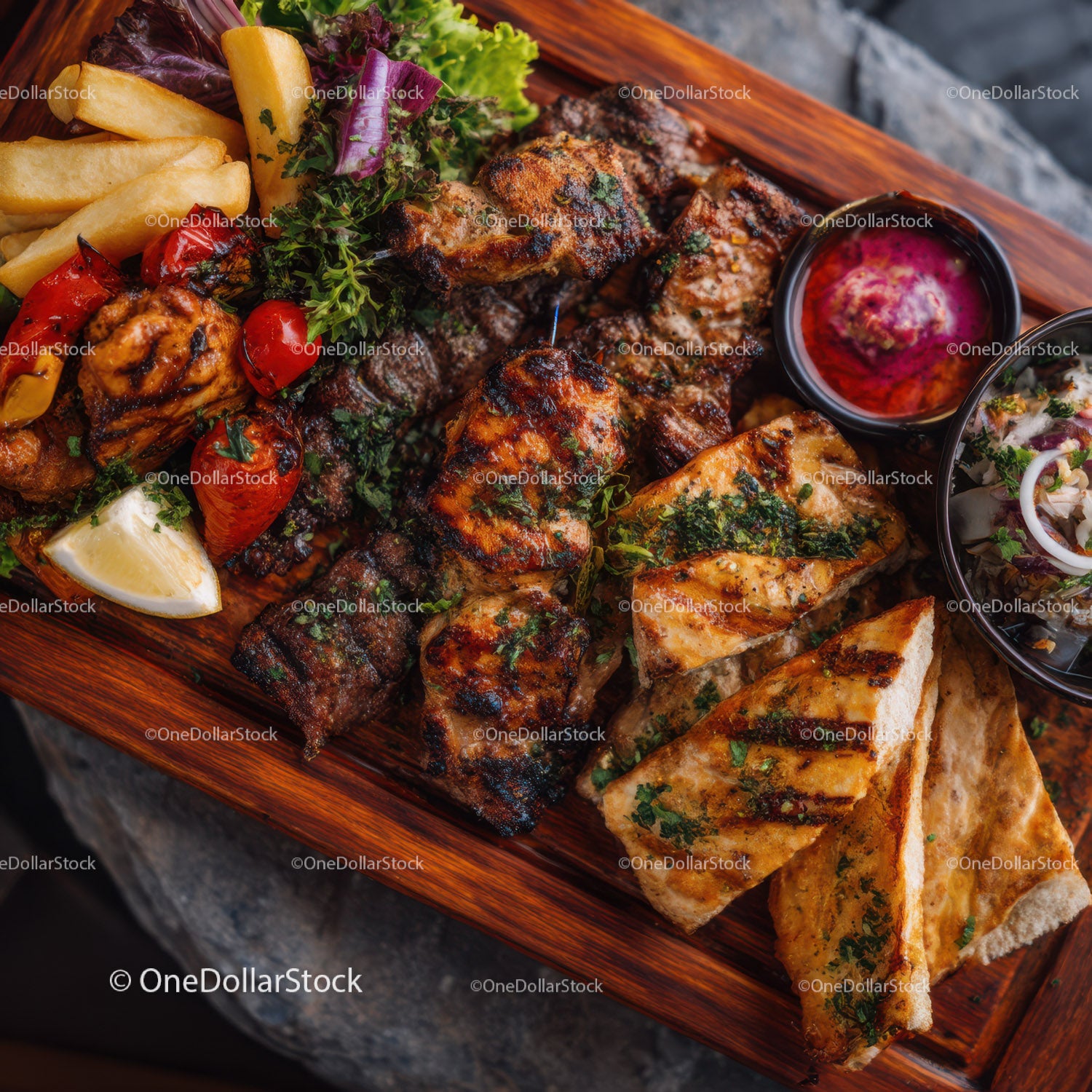 Variety of Grilled Kebabs and Accompaniments on Rustic Serving Tray
