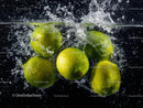 Fresh Green Limes Splashing into Water with Water Splash Effect