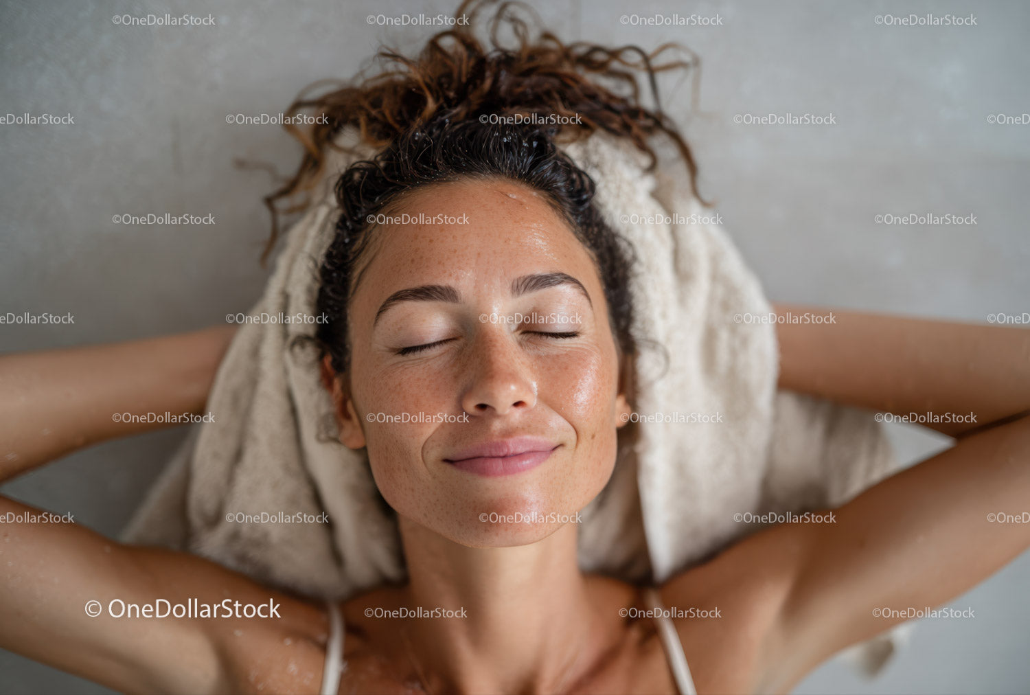 Relaxed Woman Enjoying Skincare Routine with Glowing Skin
