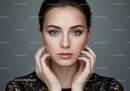 Elegant Portrait of a Woman with Blue Eyes and Flawless Skin