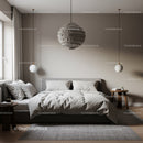 Modern Minimalist Bedroom with Pendant Lights and Cozy Bed