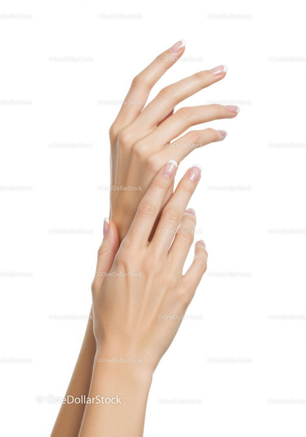 Delicate female hands with classic French manicure