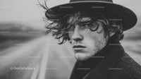Young Man in Black Hat with Curly Hair in Rainy Urban Scene