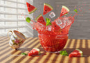 Refreshing watermelon splash with ice and mint leaves