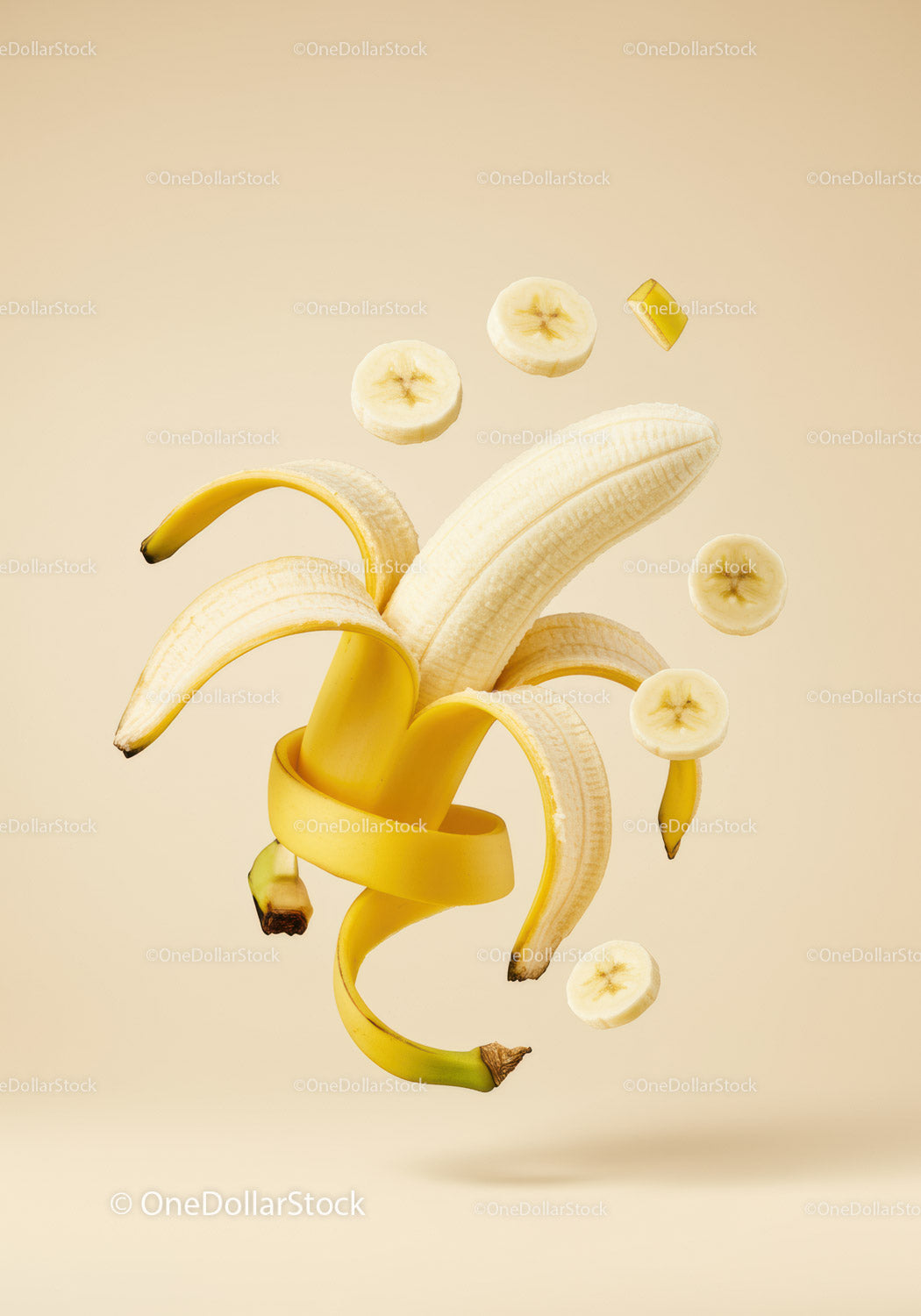 Creative Floating Peeled Banana with Slices on Neutral Background