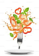 Fork with fresh shrimp and vegetables splashing vibrant sauce