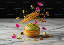 Decorative pistachio tart with caramel and petals