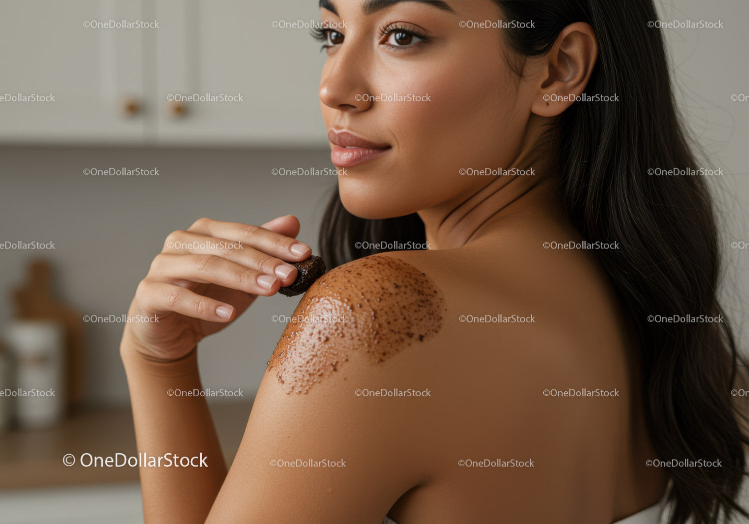 Close-up of Woman Applying Exfoliating Scrub on Shoulder in Spa