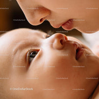 Tender moment of mother and newborn close-up