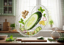 Fresh cucumber and ginger splash with herbs in kitchen