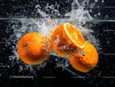 Fresh Orange Slices with Water Splash