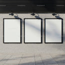Three Blank Poster Frames on Concrete Wall